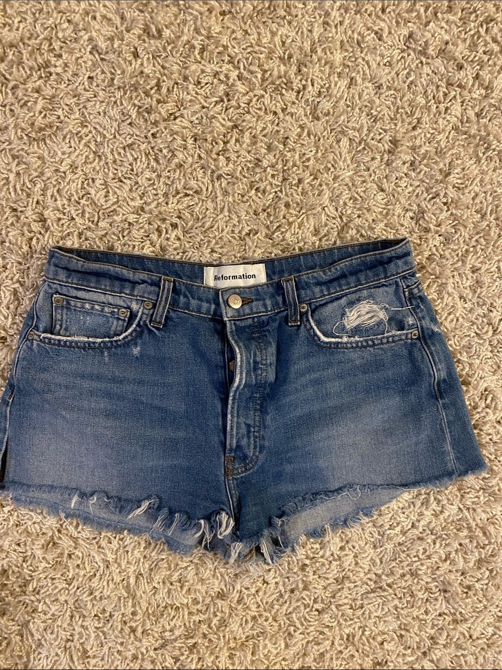Reformation denim cutoff shorts in medium blue medium